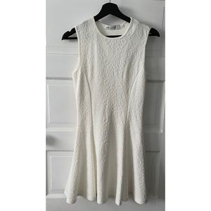 Ivory sleeveless Bishop + Young dress